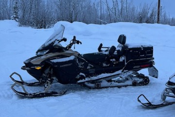 a snowmobile on some snow