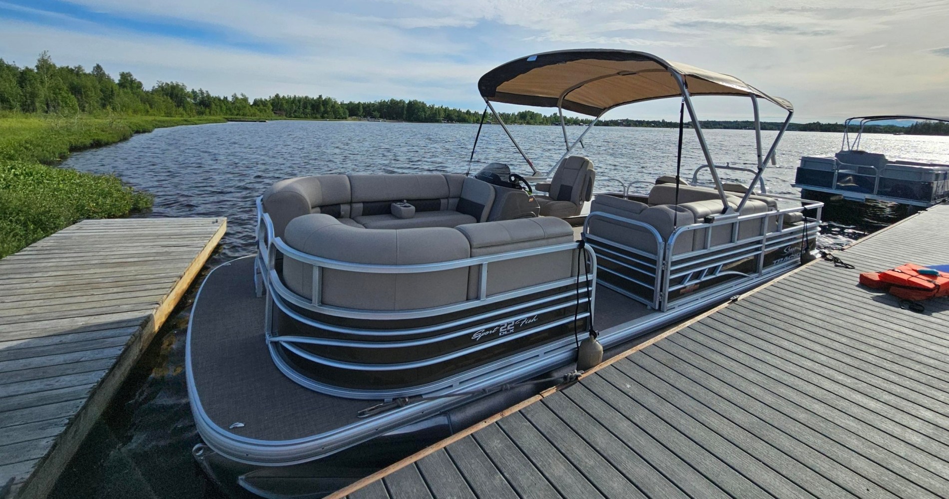 a wooden boat in a body of water