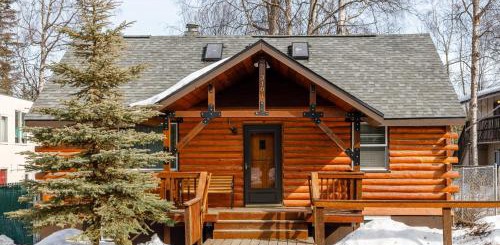 a wooden bench in front of a house