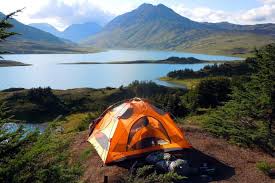 a tent with a mountain in the background